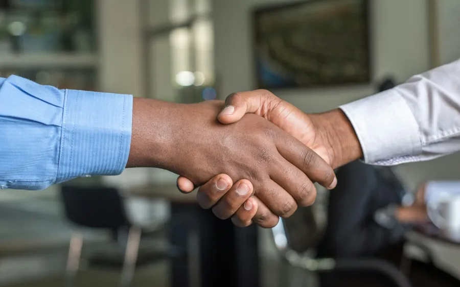 Contractor shaking hands with a client